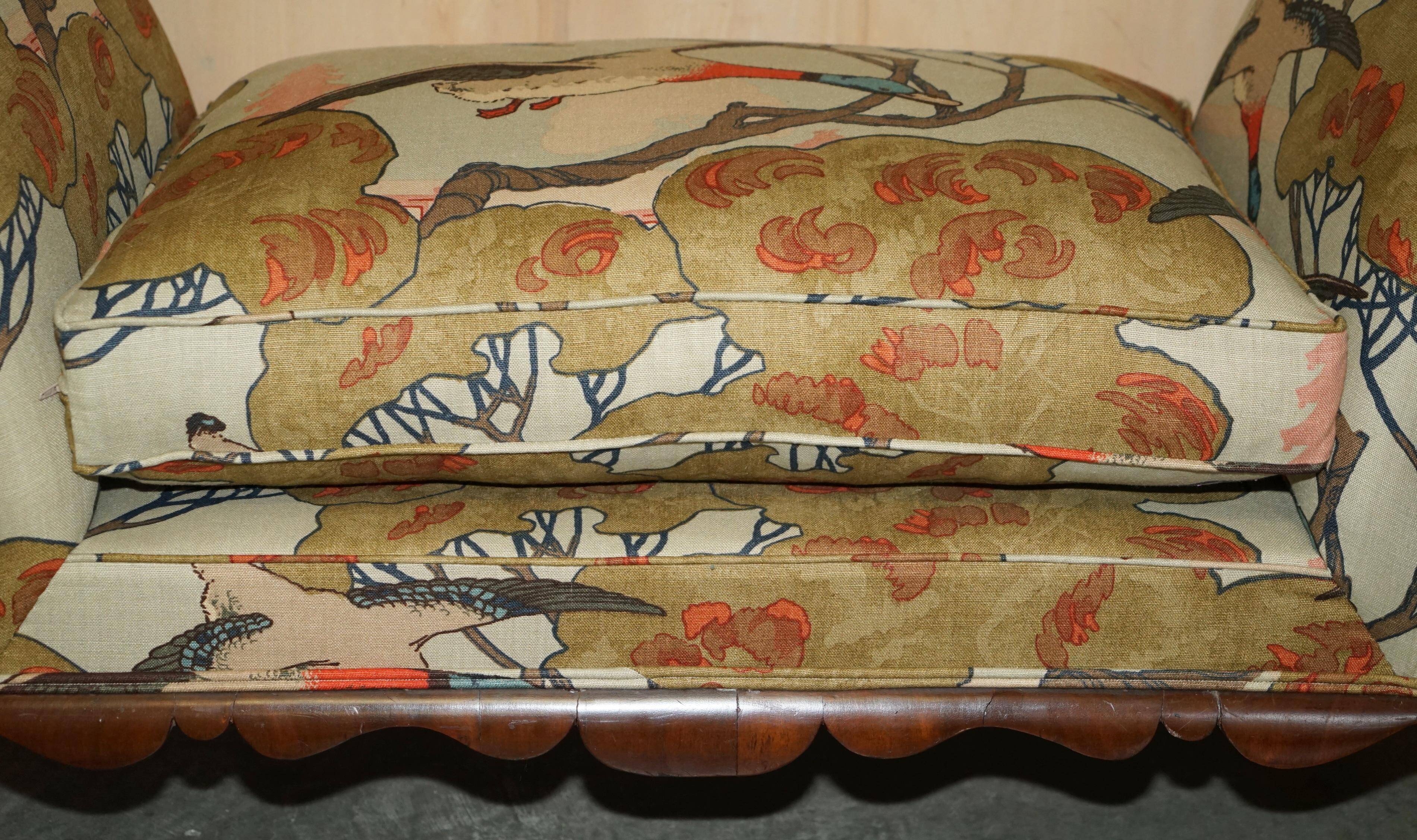 Antique banquette with cluster and ball feet, window seat in Mulberry Flying Ducks fabric.