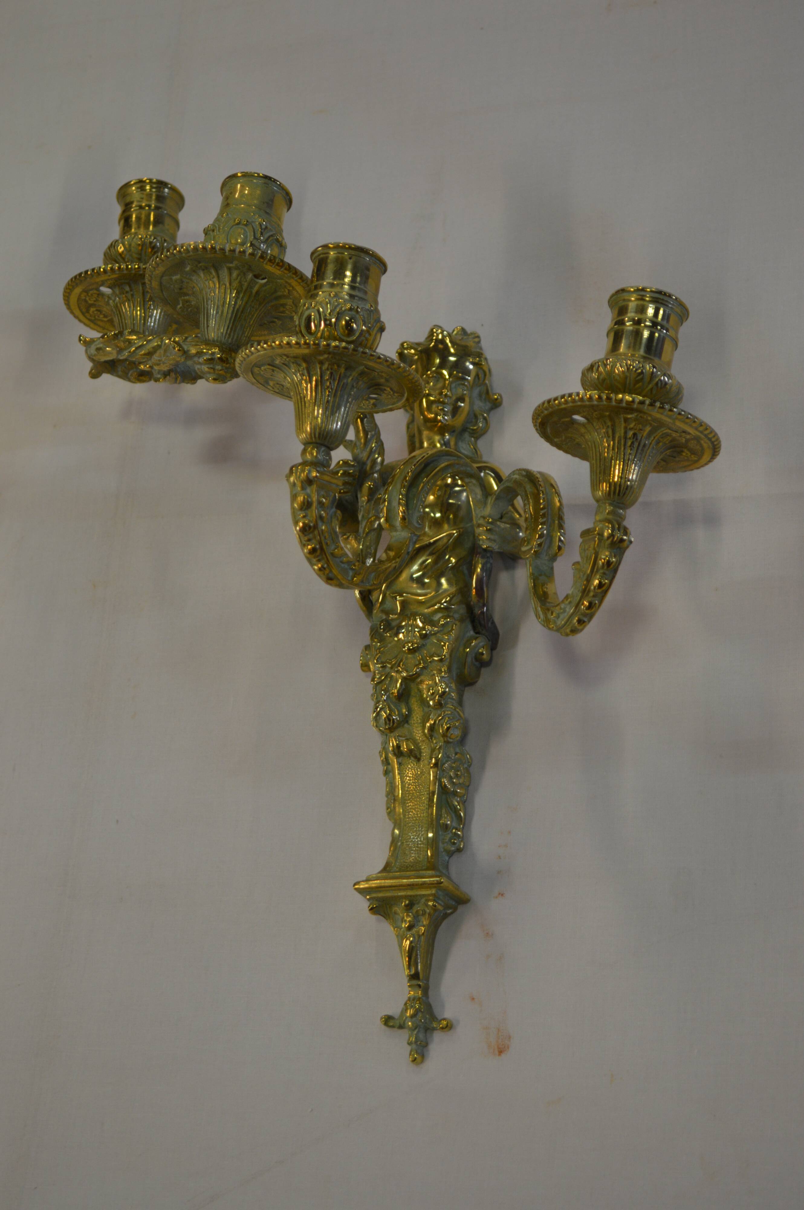 Louis XV style bronze sconces with cariatids