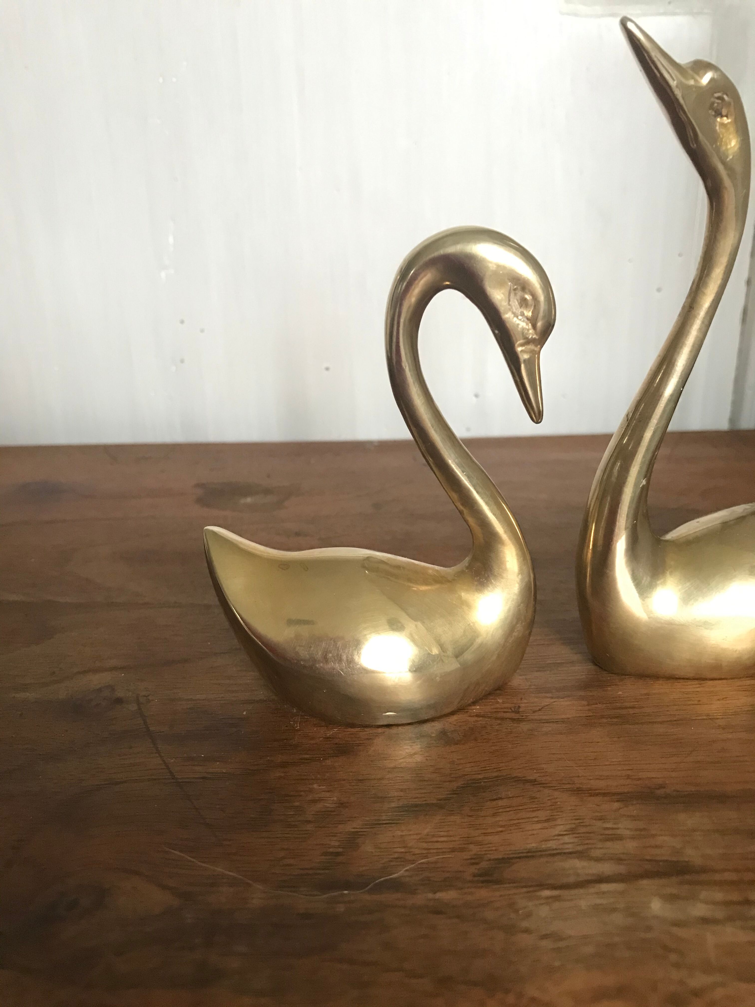 Couple of brass swans