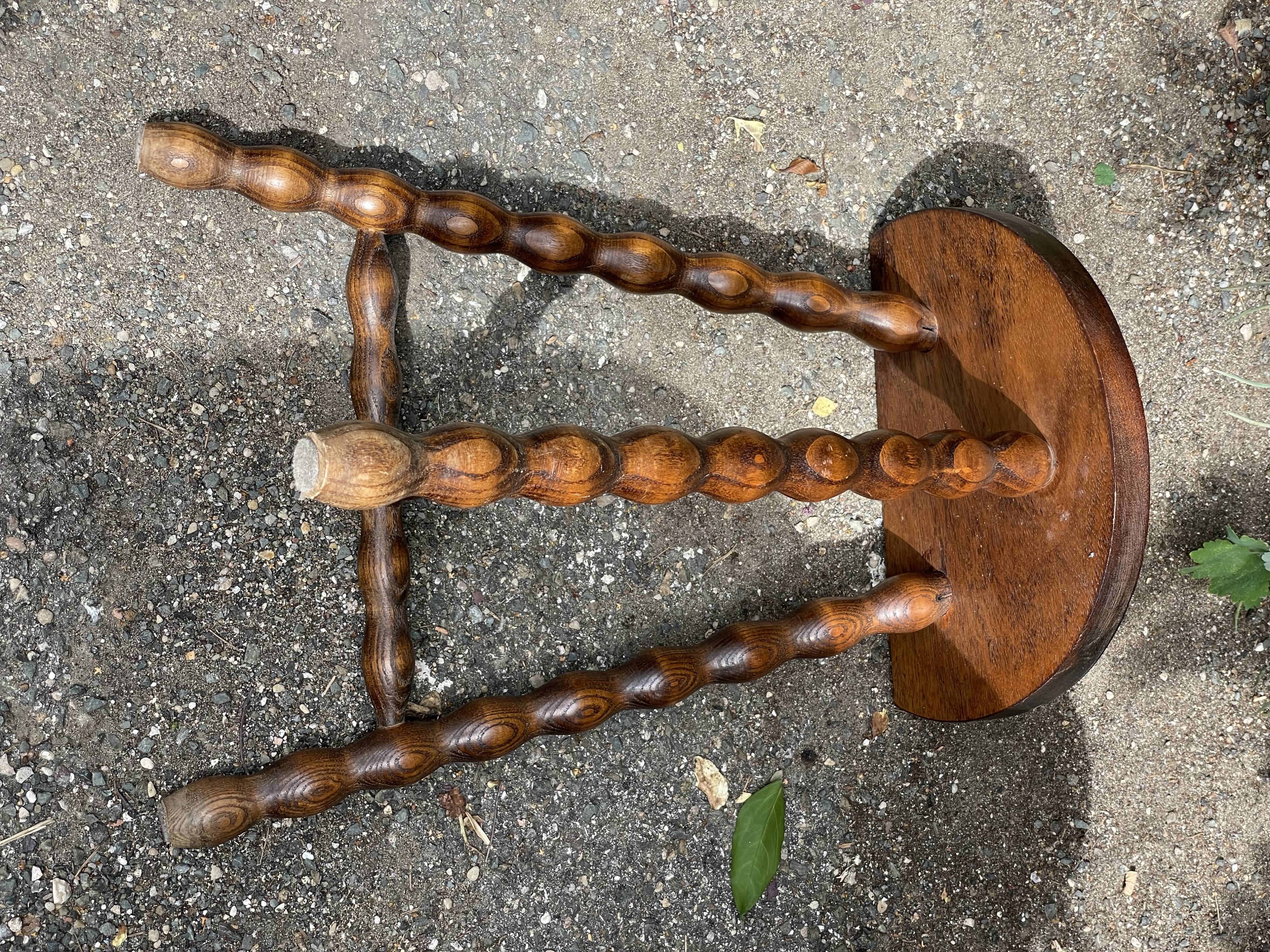 Wooden tripod stool