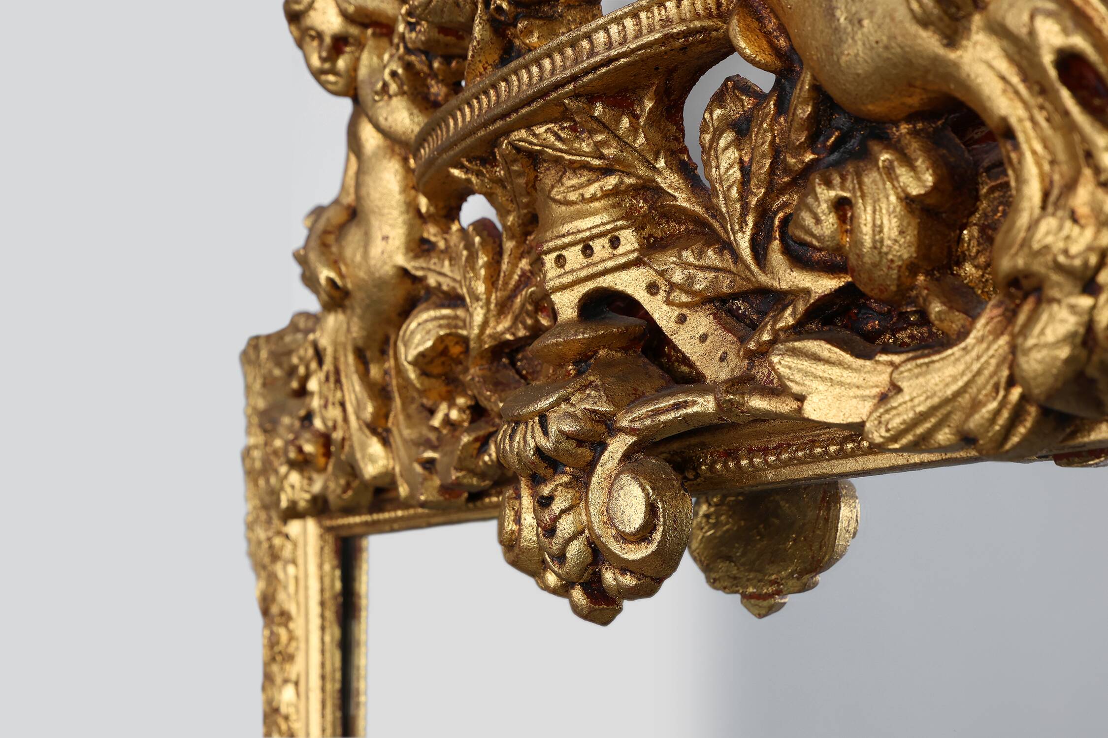 French rococo style richly sculpted gilted oak mirror, 19th century