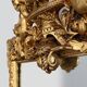 French rococo style richly sculpted gilted oak mirror, 19th century