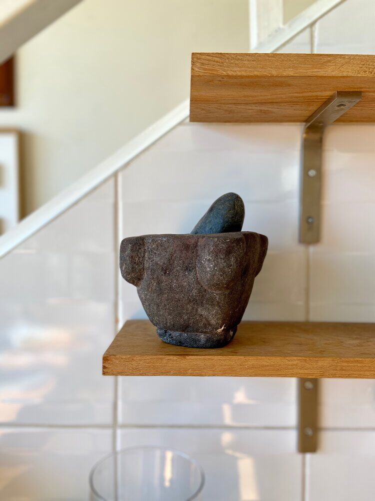 Mortar and pestle in black stone