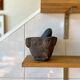 Mortar and pestle in black stone