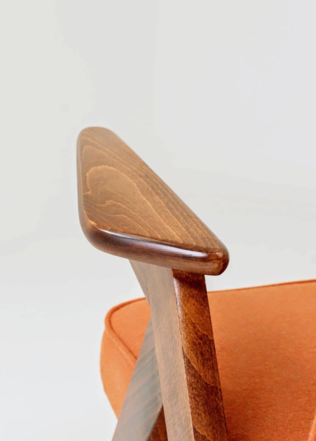 Fauteuil lounge vintage en laine, tissu orange et bois de hêtre