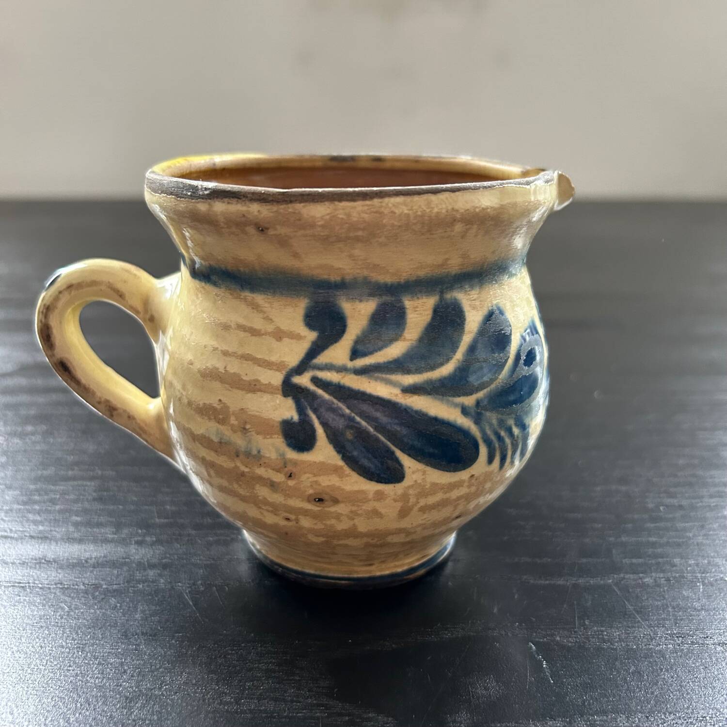 Pitcher with blue floral decor