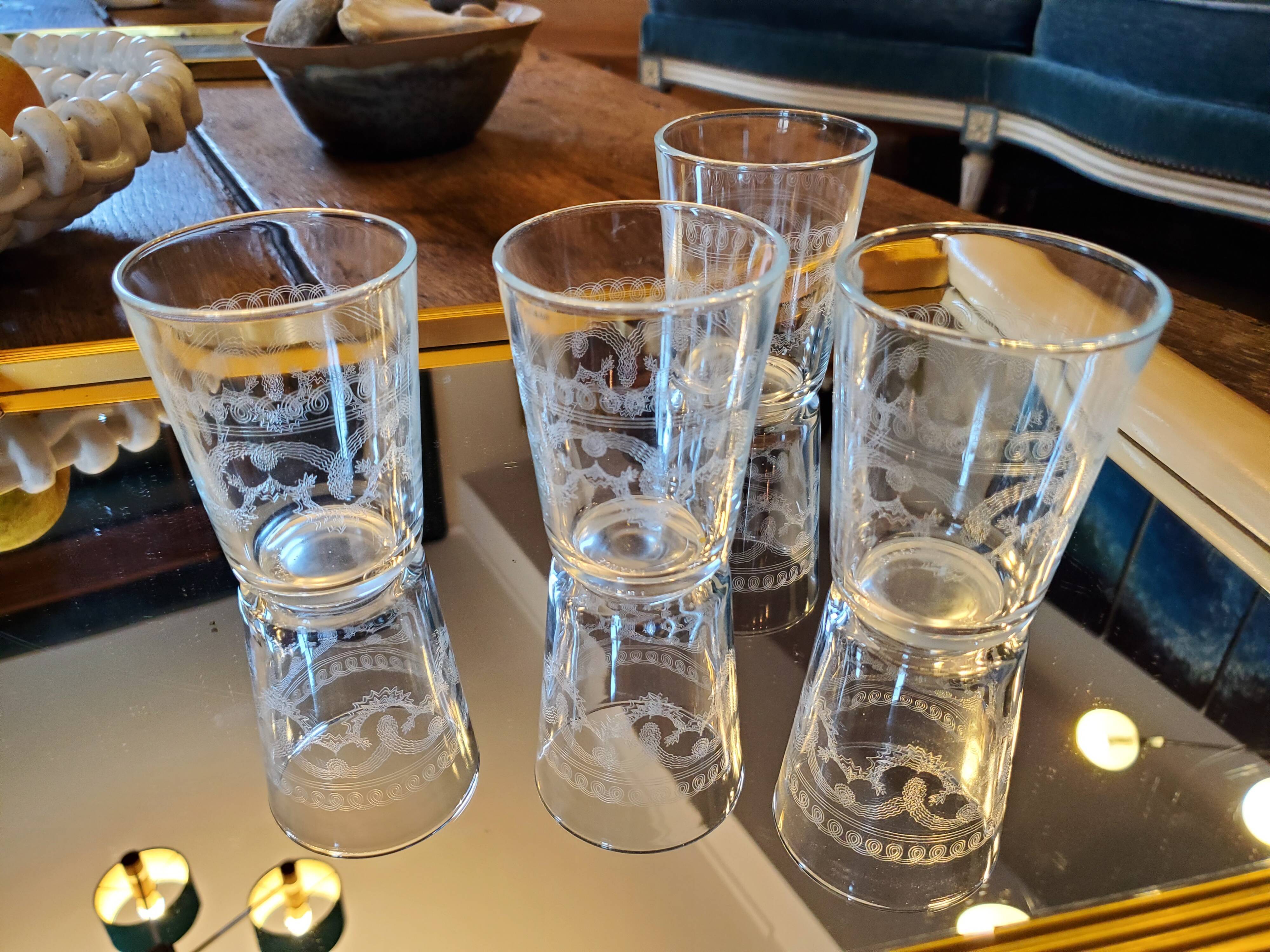 4 chiseled water glasses decoration arabesques and scrolls