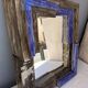 Mirror with ceramic frame
