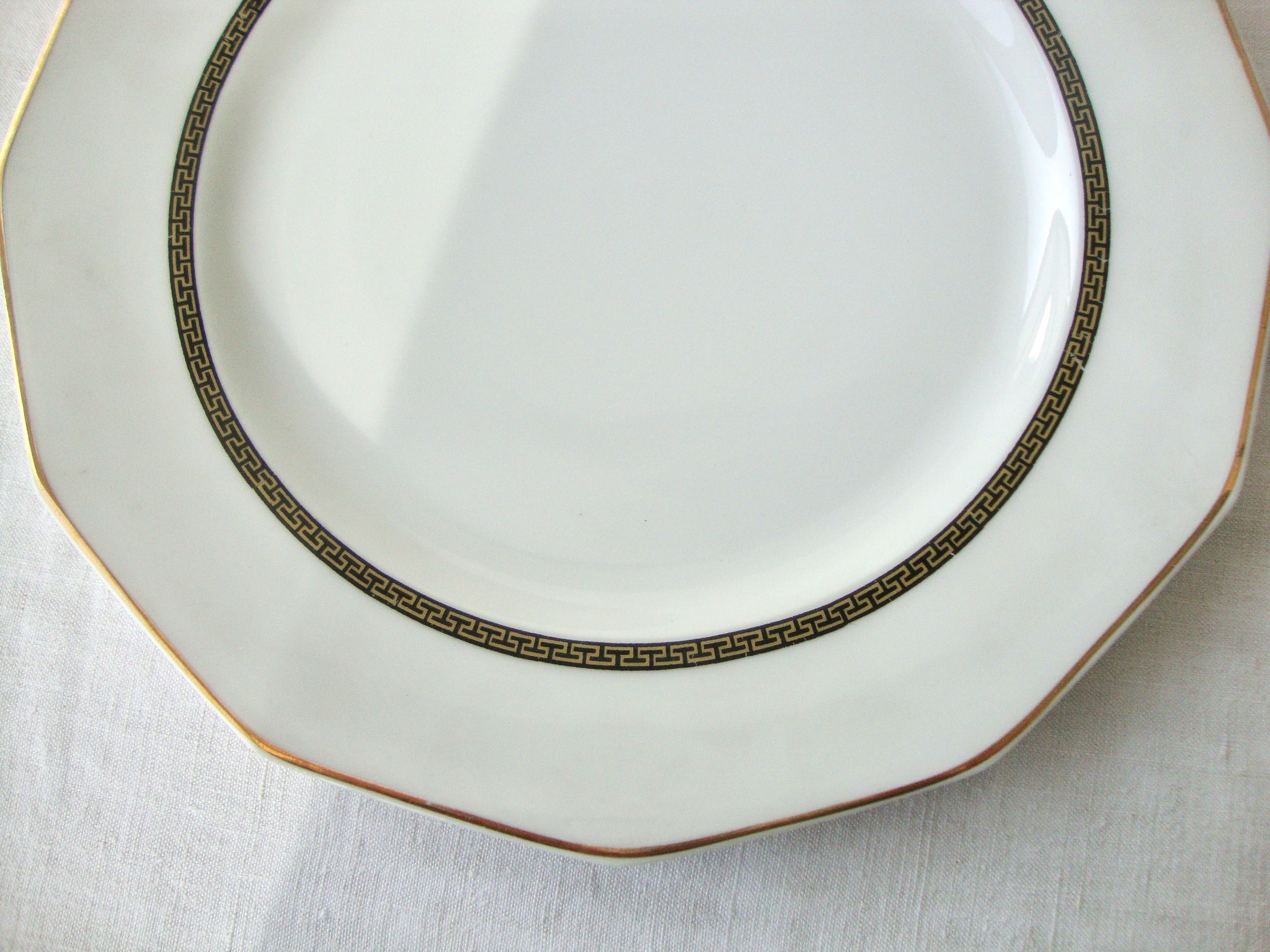Set of 9 Limoges porcelain dessert plates