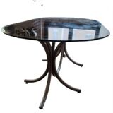 Large oval table from the 70s in smoked glass with chrome legs