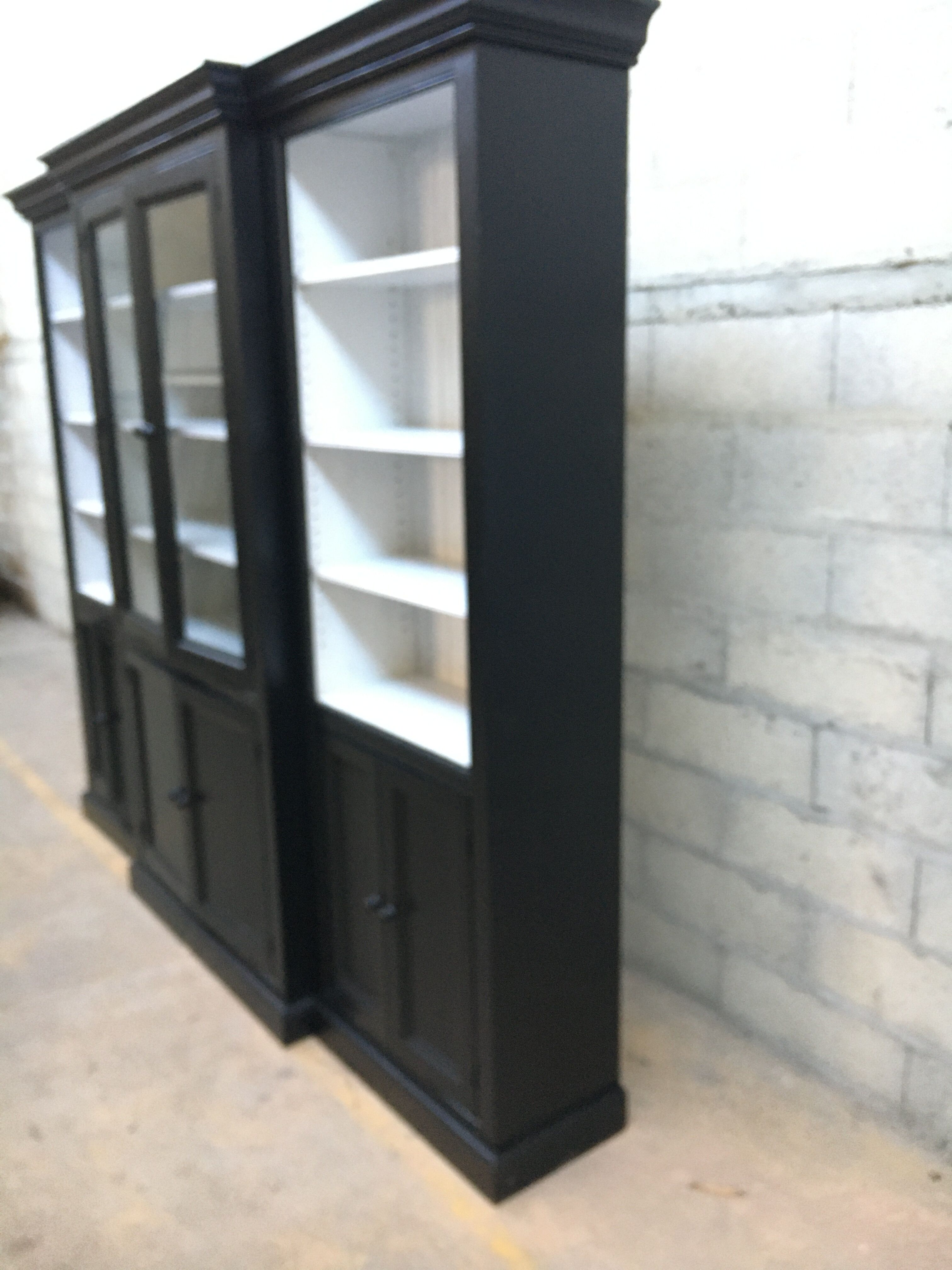 Black patinated wooden bookcase