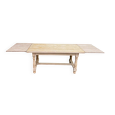 Renovated extendable farmhouse dining table made of solid raw oak from the 1950s.