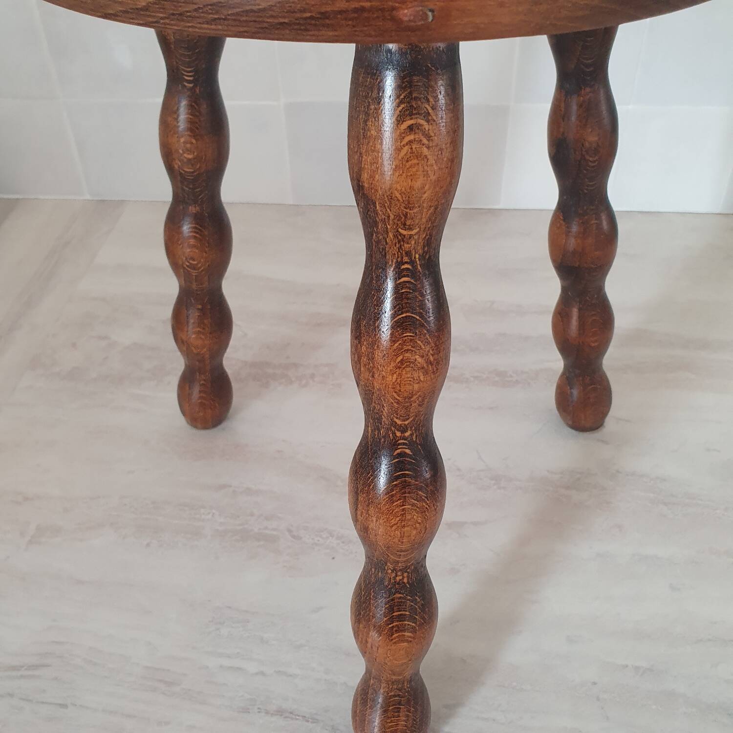 Turned wooden stool / tripod with round seat