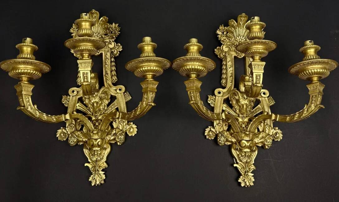 A pair of important gilt bronze wall sconces, Louis XVI style, 19th century.
