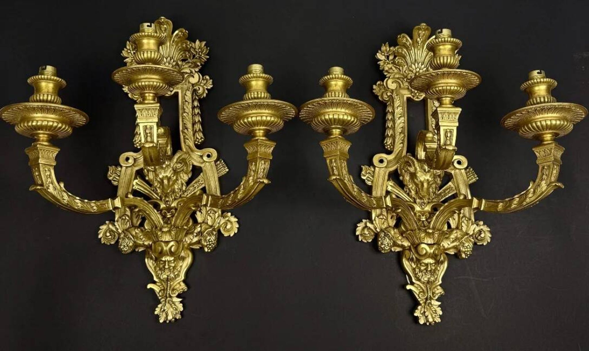 A pair of important gilt bronze wall sconces, Louis XVI style, 19th century.