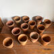 13 tasses à café en grès