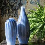 Pair of vintage smoky glass vases lined with opaline, Murano bubble glass.
