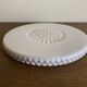 Pierre Motton glazed earthenware scalloped trivet for Gien