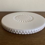 Pierre Motton glazed earthenware scalloped trivet for Gien