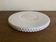 Pierre Motton glazed earthenware scalloped trivet for Gien