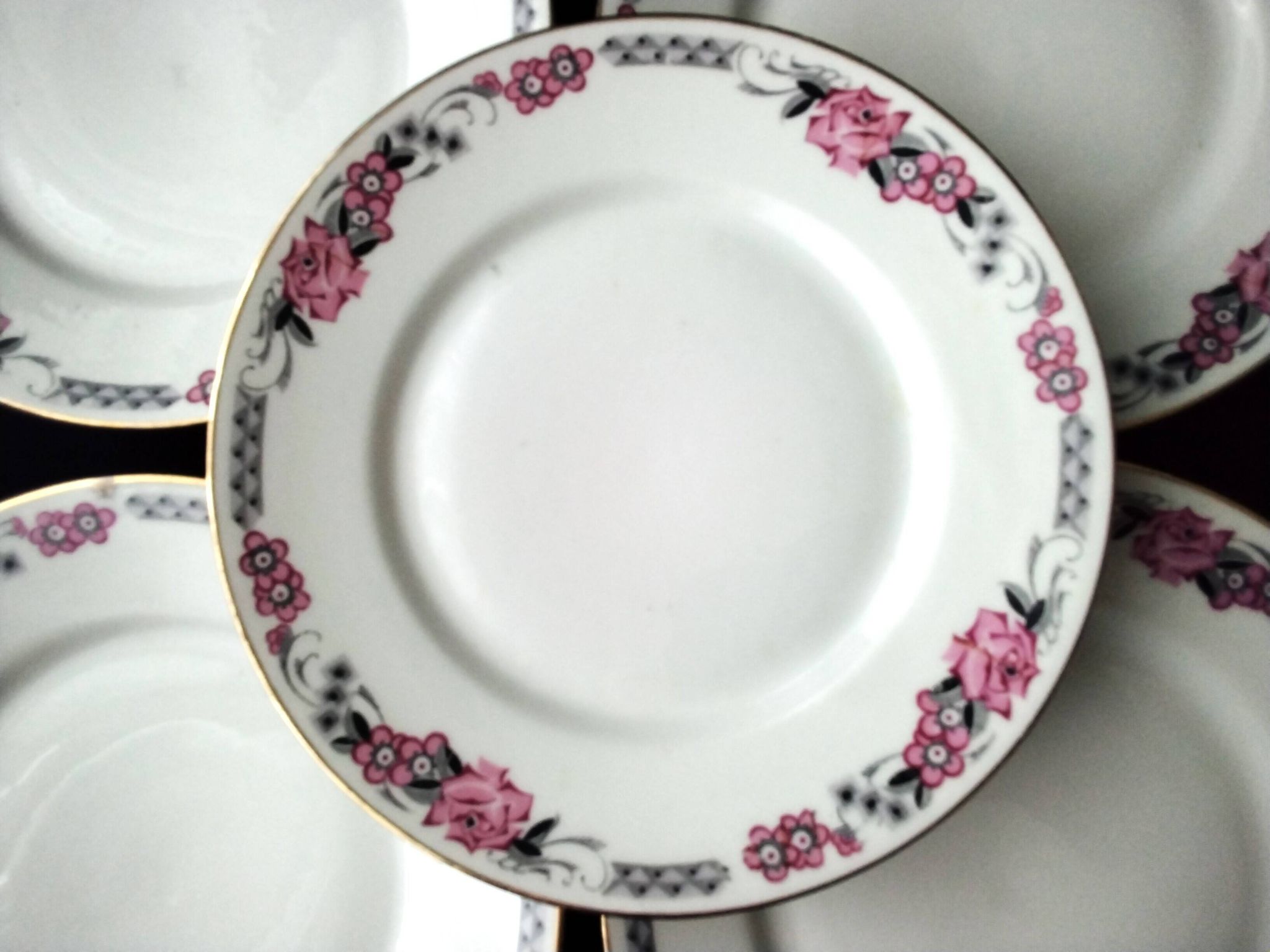 5 Assiettes à dessert en porcelaine  Art Déco