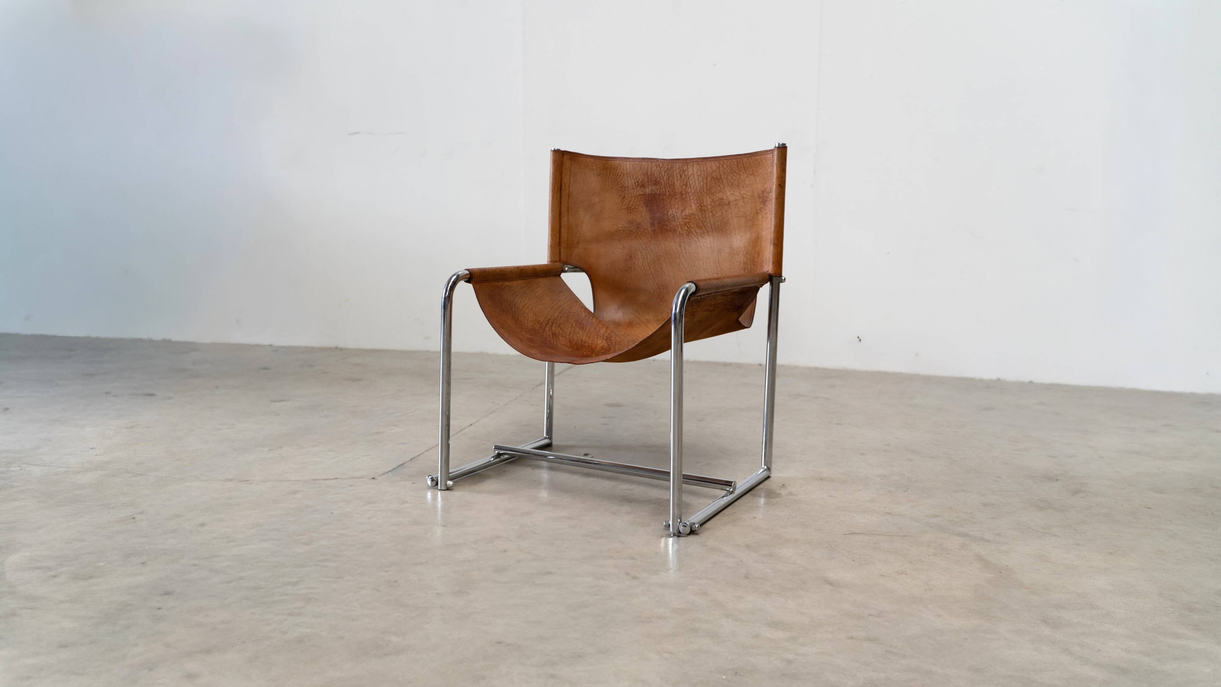 Fauteuil simple en cuir italien