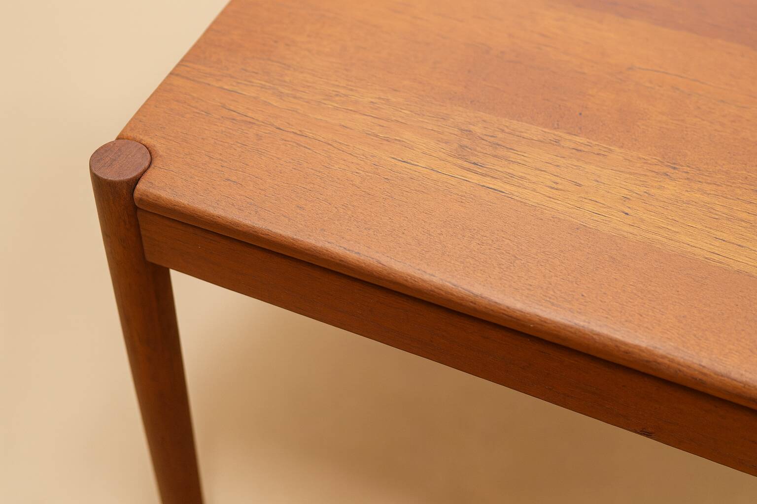 Vintage Danish teak coffee table published by Magnus Olesen.