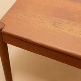 Vintage Danish teak coffee table published by Magnus Olesen.