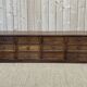 Long low oak countertop with 12 drawers - early XXth
