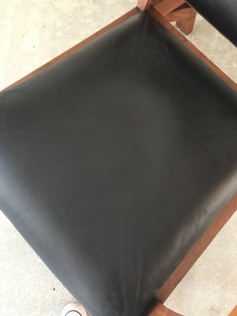 Teak armchair and black leather
