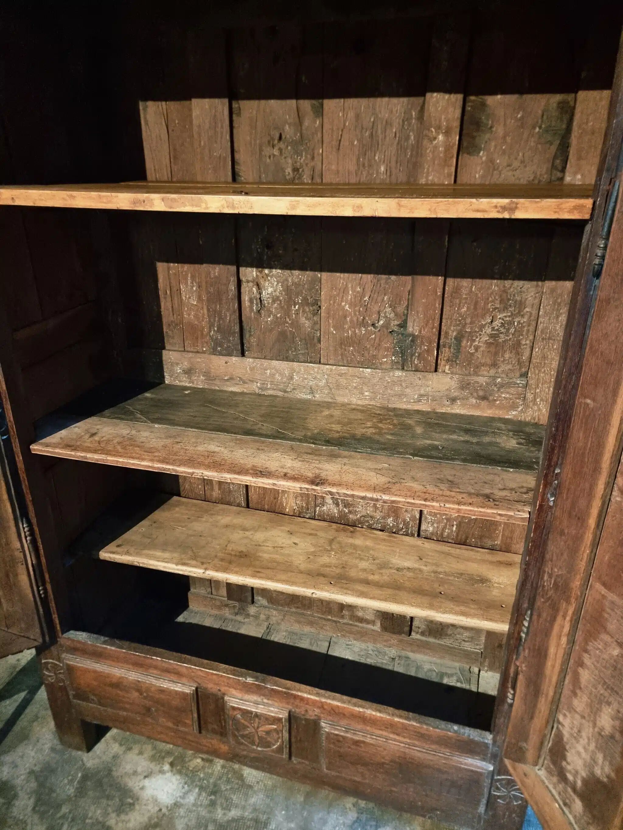 French oak armoire, late 17th - early 18th century, Louis XIV provincial style with hand-carved rosettes