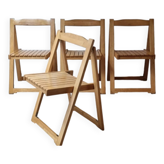 Vintage folding chairs in light wood