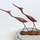 Scandinavian modernist sculpture cranes in teak.