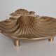 Scallop-shaped ashtray
