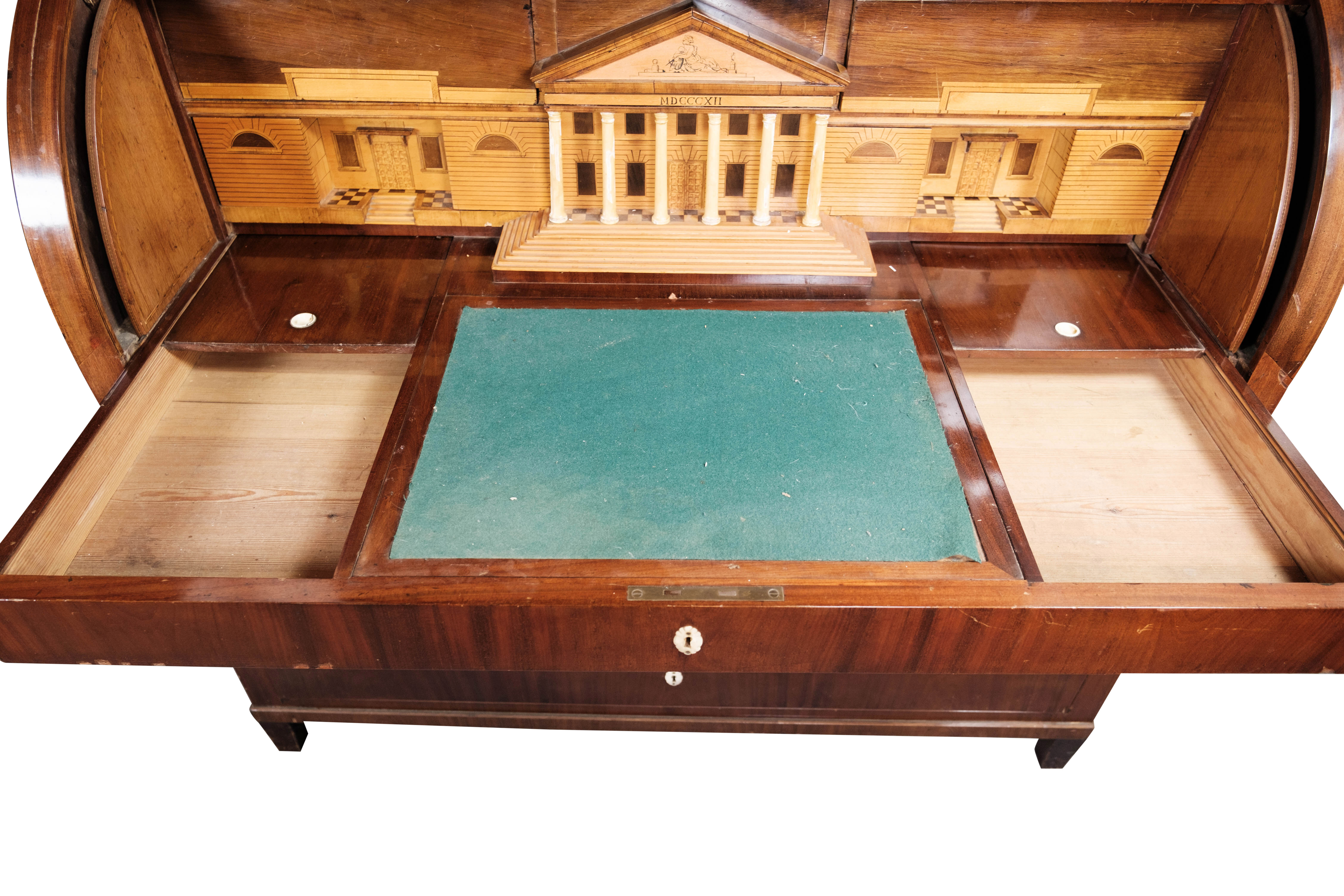Empire bureau of polished mahogany with inlaid wood, 1840s