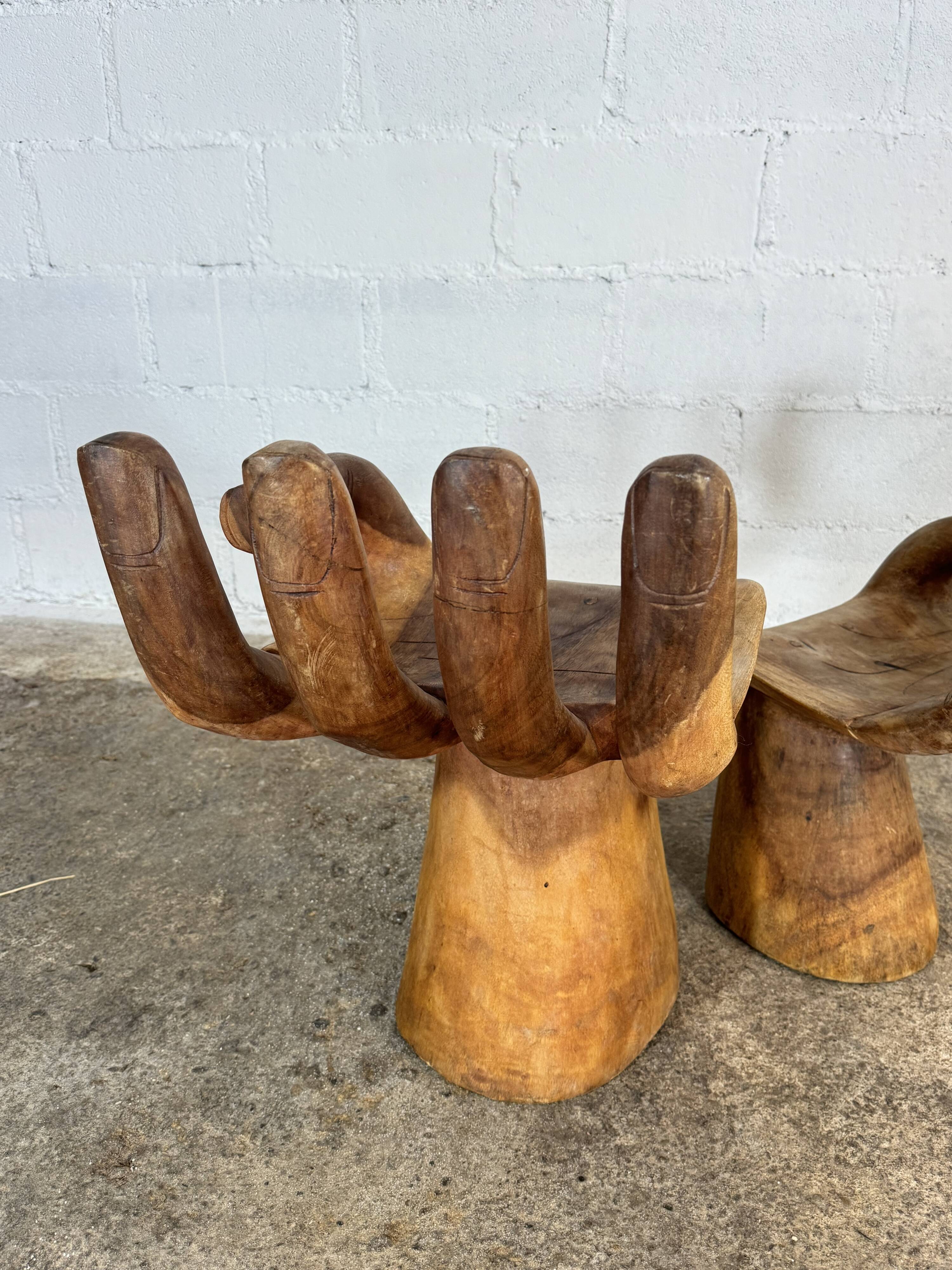 Hand carved chairs in the Pedro Fiedeberg style