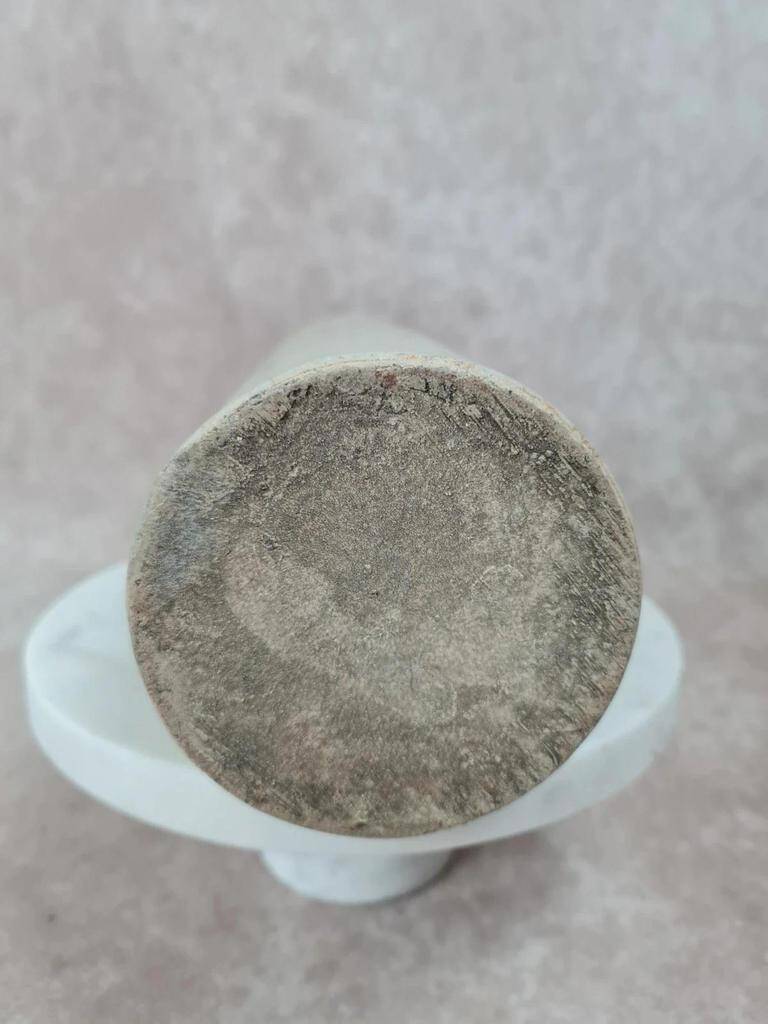 Antique beige glazed stoneware bottle from the 19th century, with a handle, vintage decor.