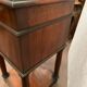 Empire style mahogany bedside table