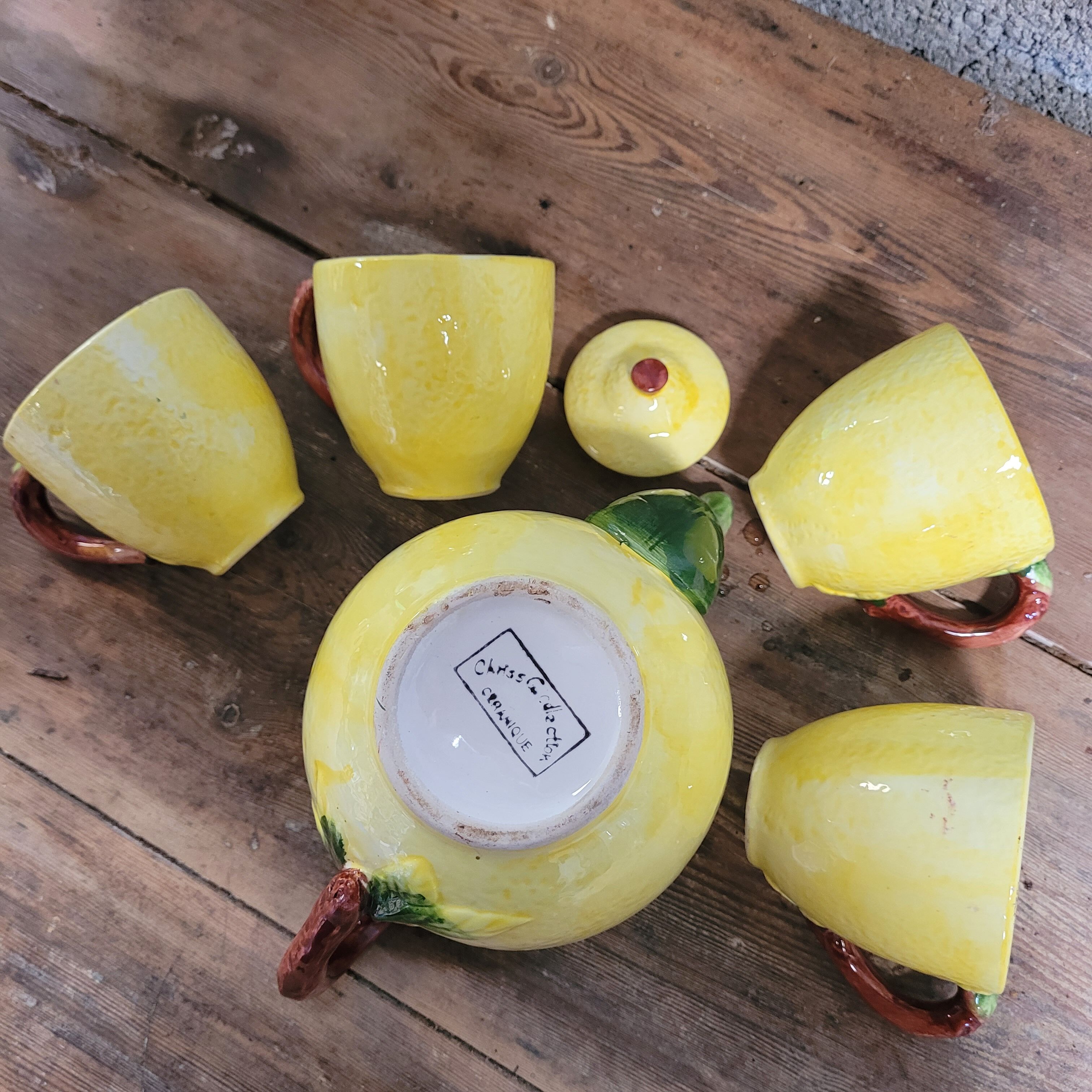 Teapot with slip cups