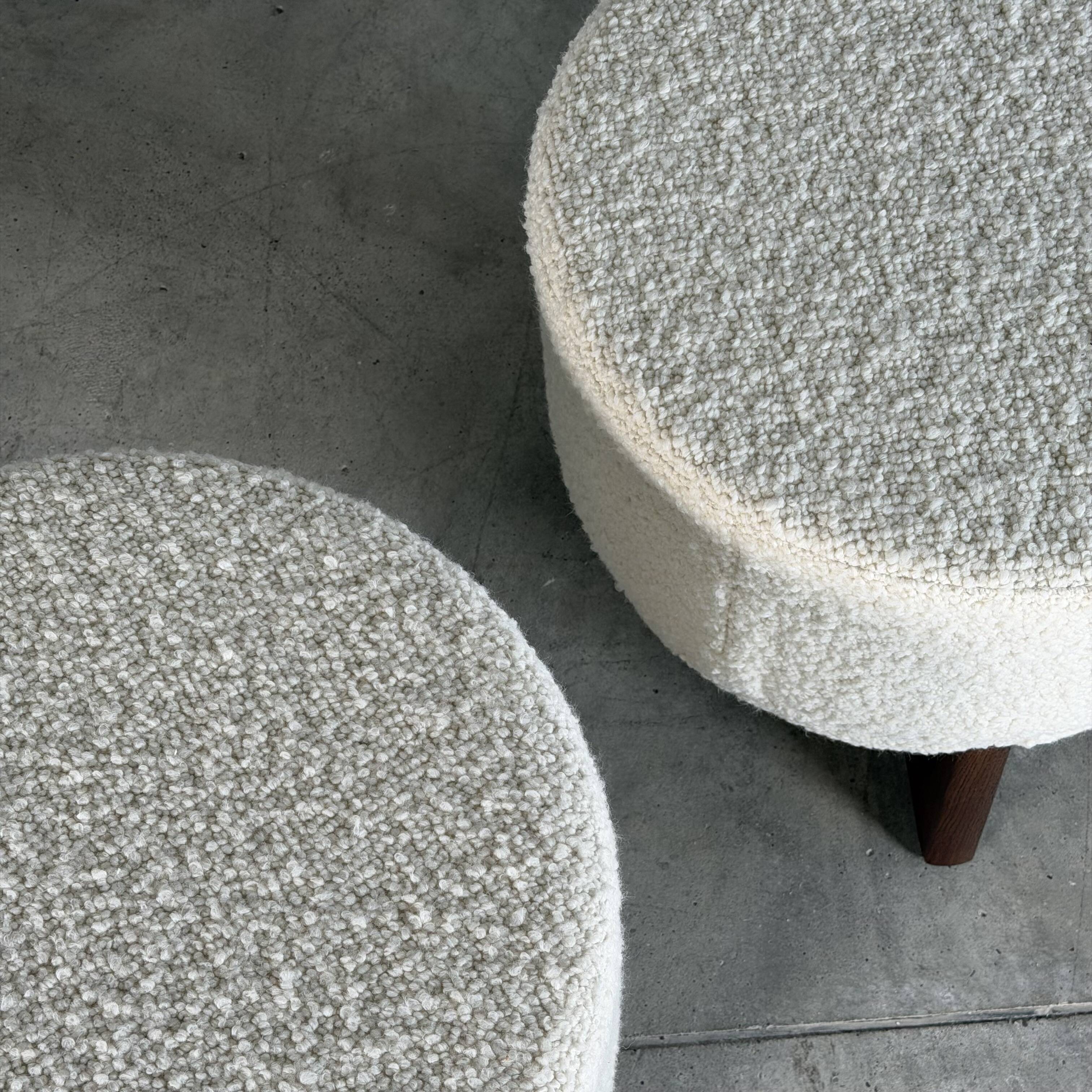 TOTEMO stools by FORME with ivory Dedar bouclé upholstery and walnut legs.