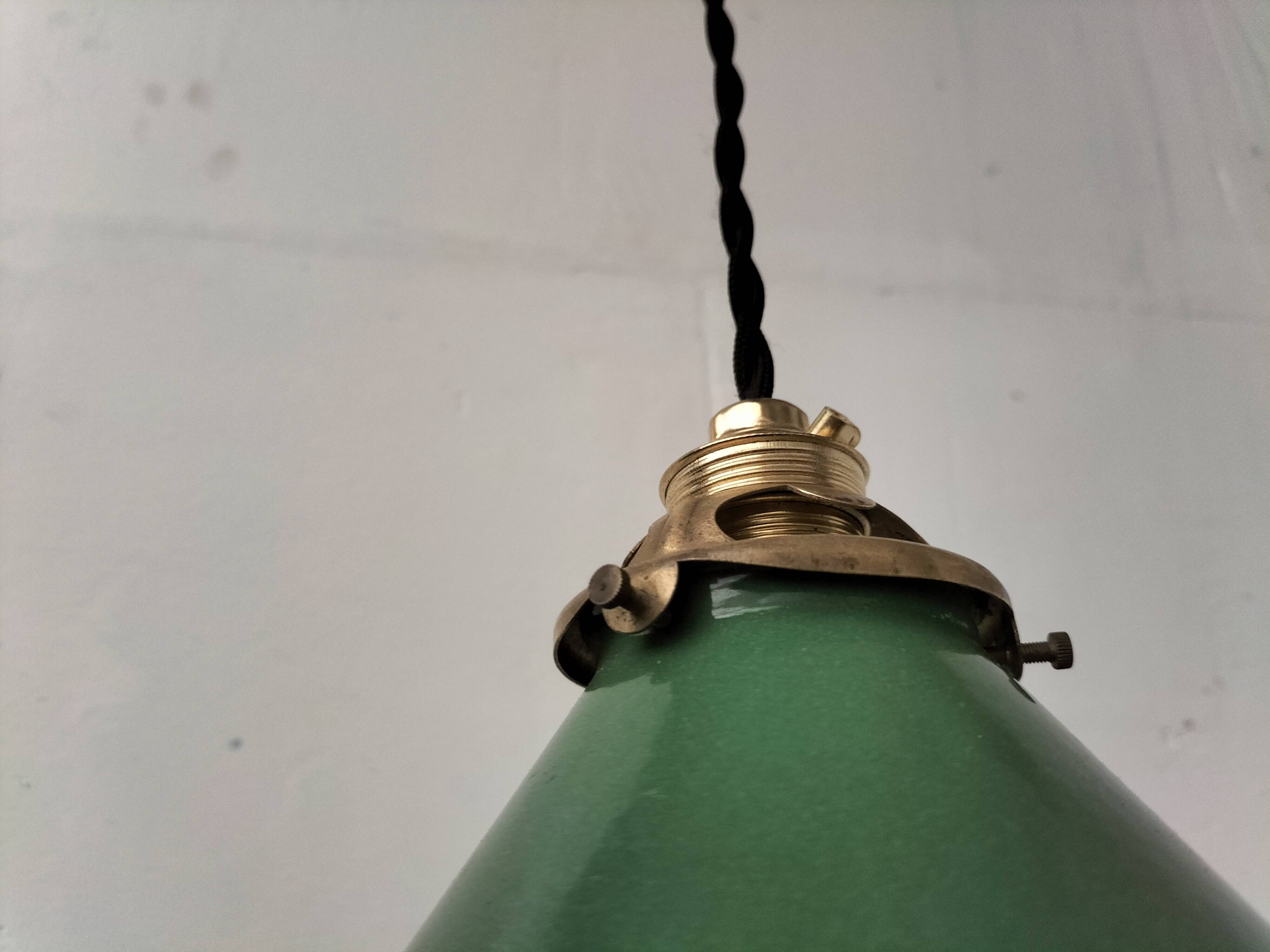 Enamelled sheet metal cone suspension