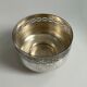 Vintage silver cup with a glass interior.