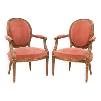 Pair of Louis XVI style convertible armchairs