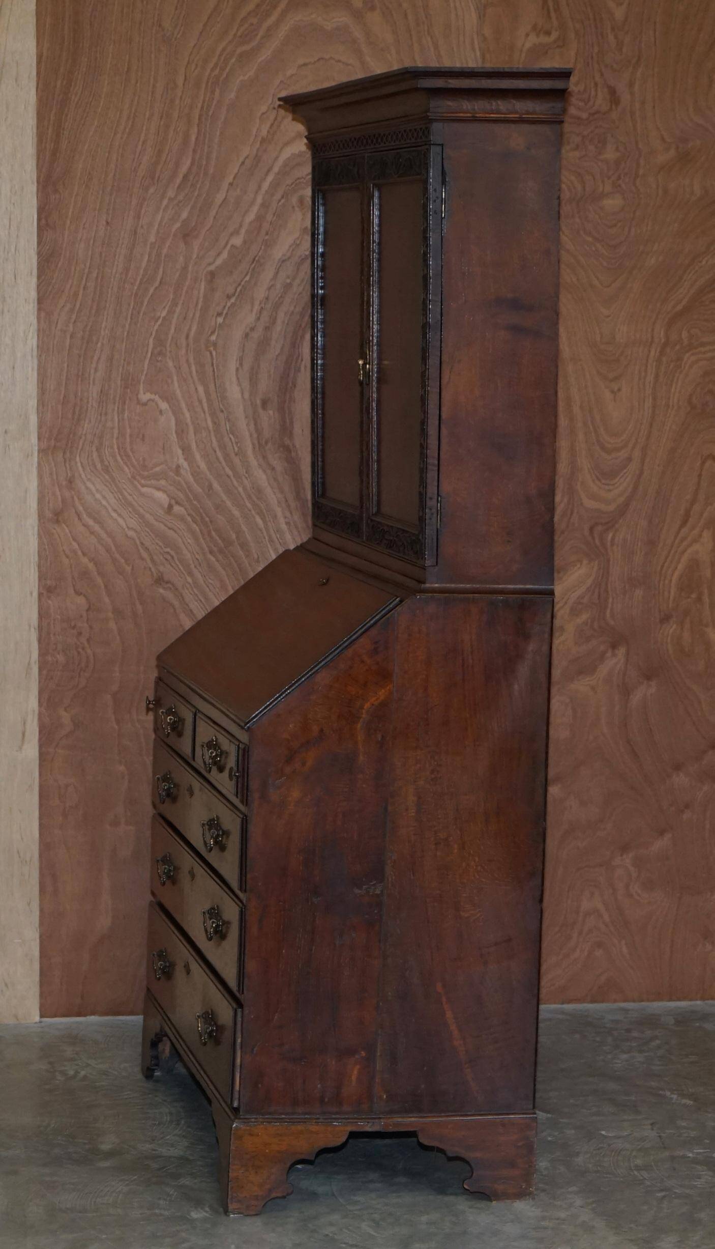George III oak secretary bookcase circa 1760, Thomas Chippendale style.