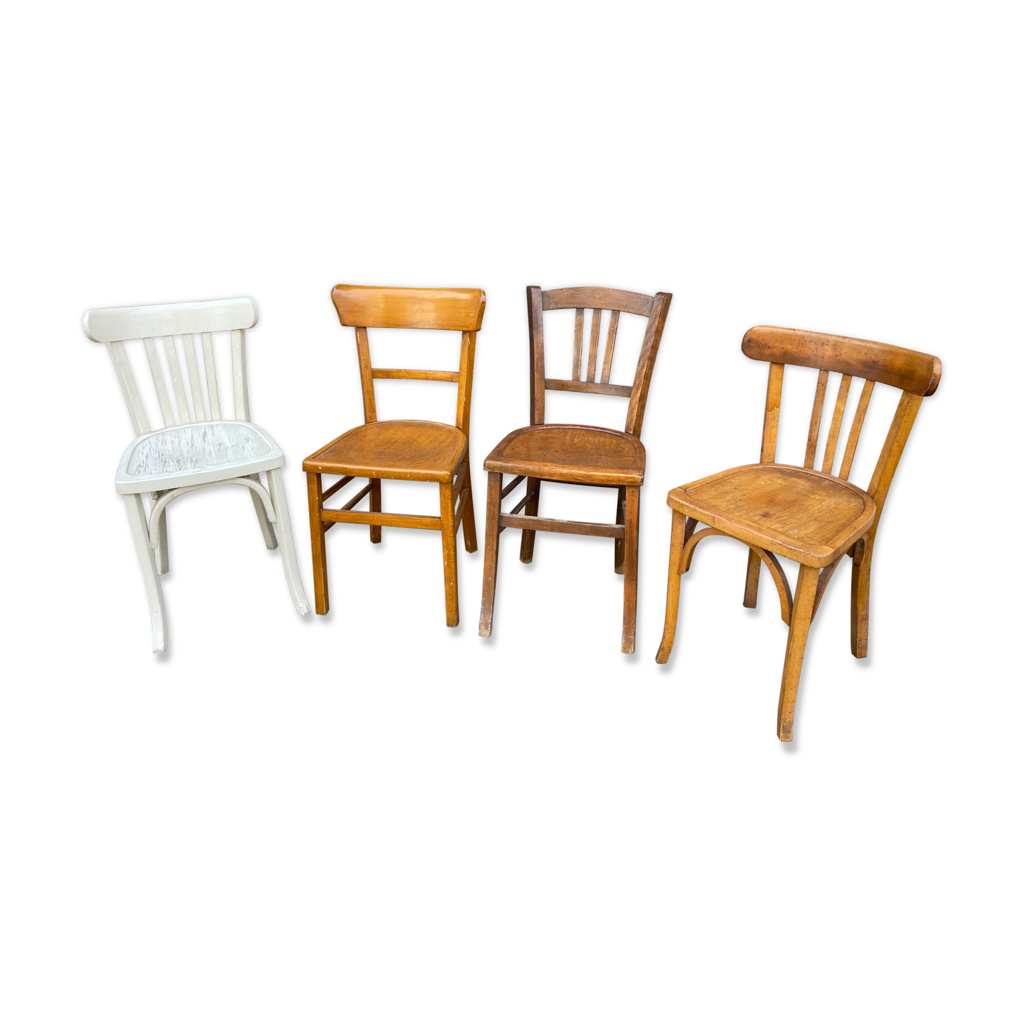 4 mismatched curved wooden bistro chairs