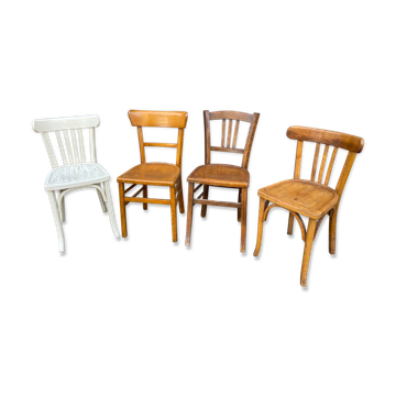 4 mismatched curved wooden bistro chairs