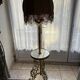 Living room floor lamp in bronze and white marble.