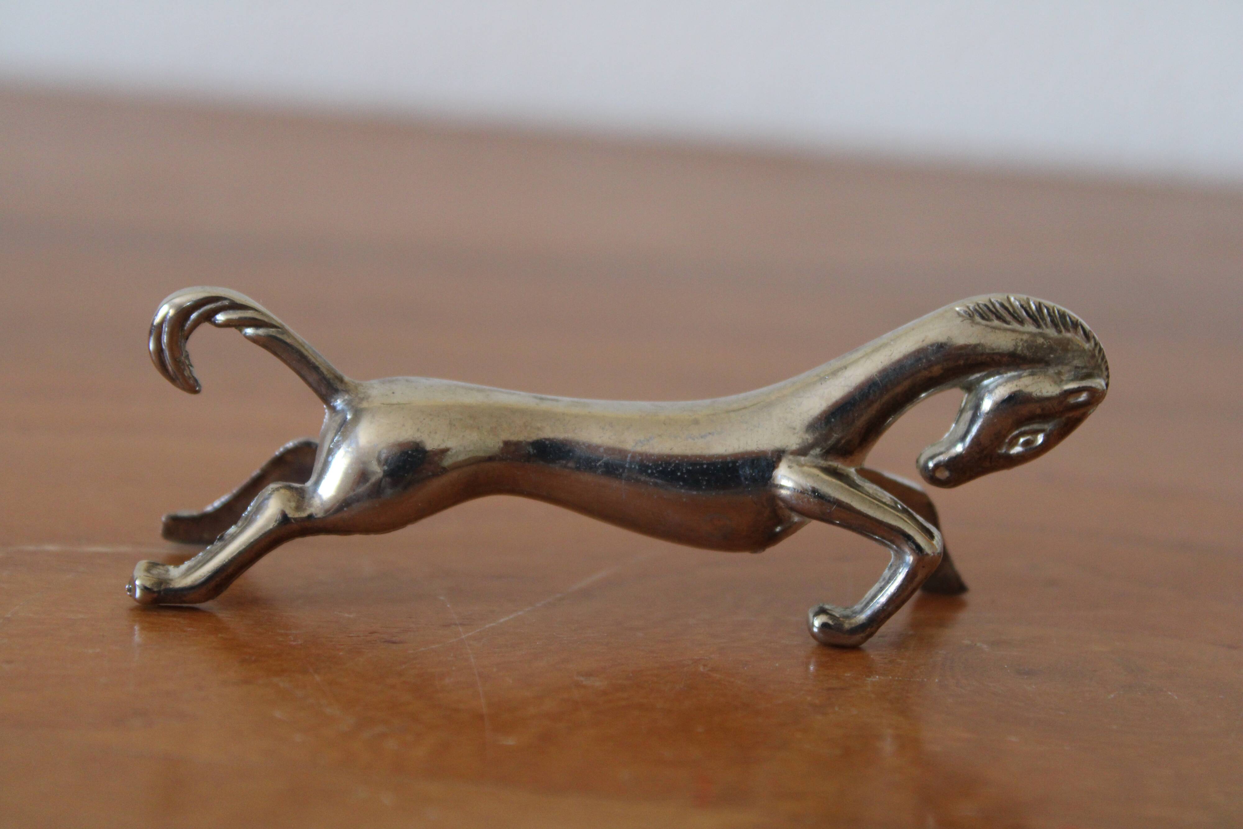 Set of 12 vintage knife rests, in silver metal