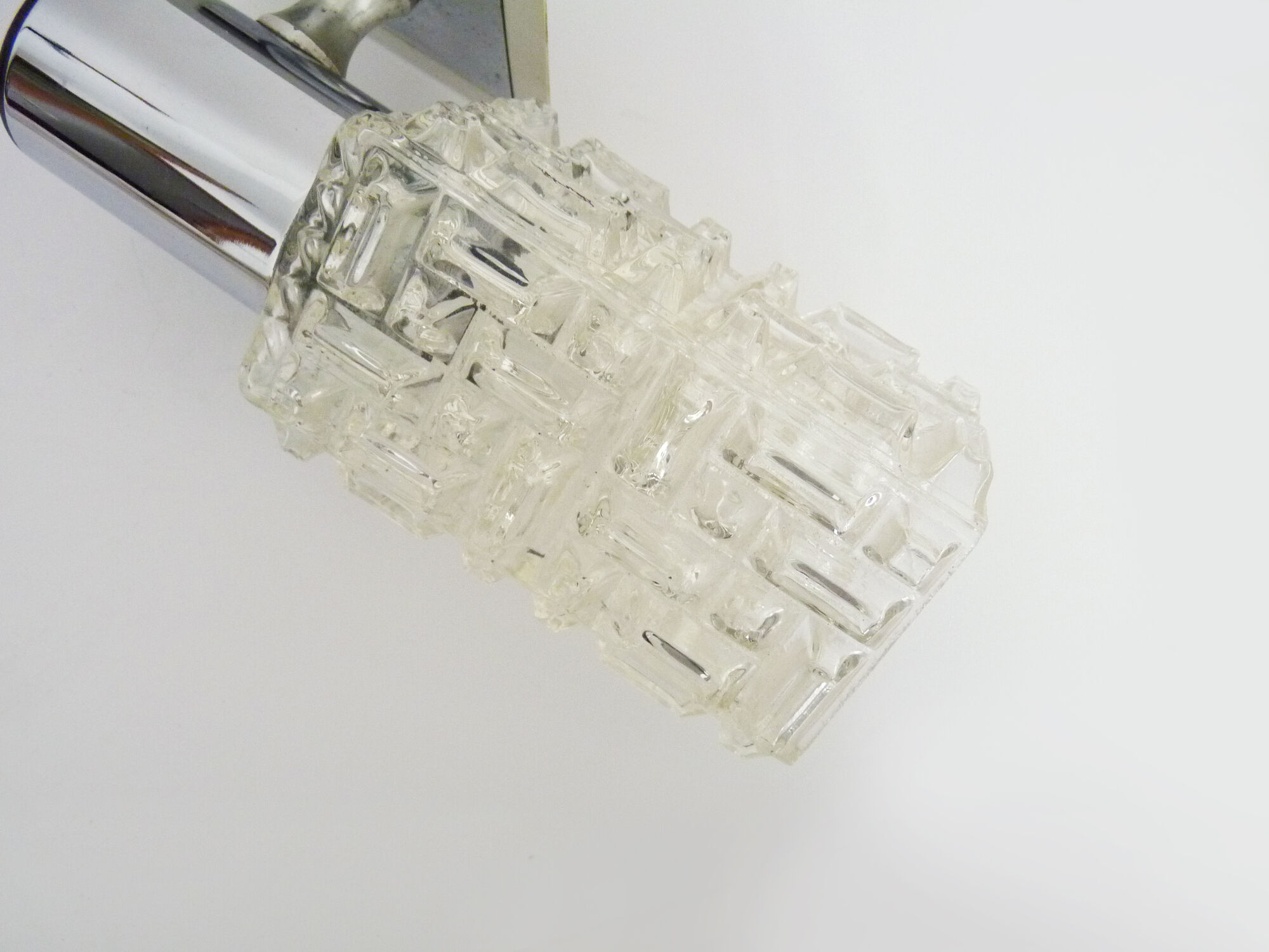 Pair of space age wall sconces, stainless steel and thick glass, 60s 70s