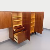 High Scandinavian modernist vintage sideboard in teak and black metal.